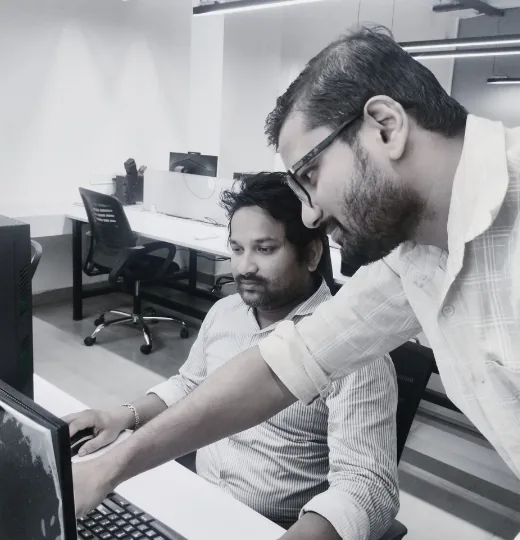 Aarav Infotech engineers reviewing a client website during a maintenance check