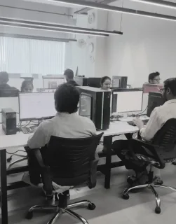 Aarav Infotech engineers monitoring client websites from the Mumbai operations floor